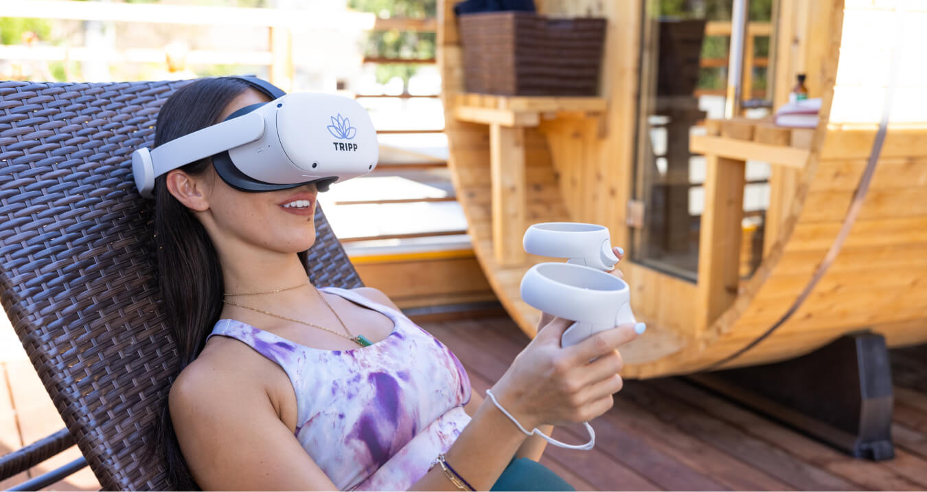 A woman with TRIPP VR glasses